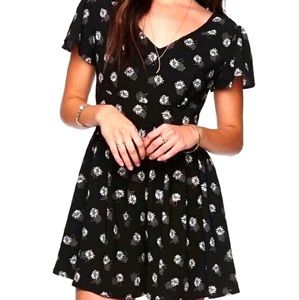 Black Romper With Flowers